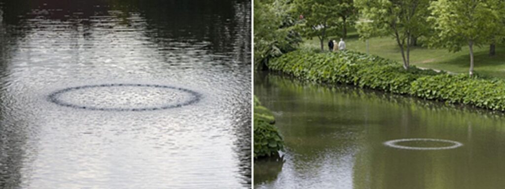 Cylinder, 2008, Aluminium, pump, rubber hose , Diameter 300 cm, height 50 cm , Purchased by Odense Bys Kunstfond, installed permanently in the public domain of Odense.
