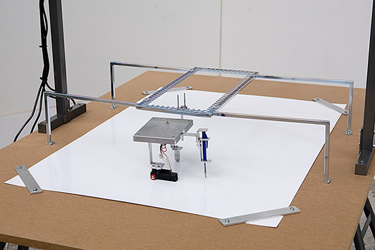 Henrik Menné Drawing Machine 2007 ballpoint pen, paper, mdf, aluminum, iron, engine machine 140 x 105 x 155 cm drawings ca. 70 x 100 cm