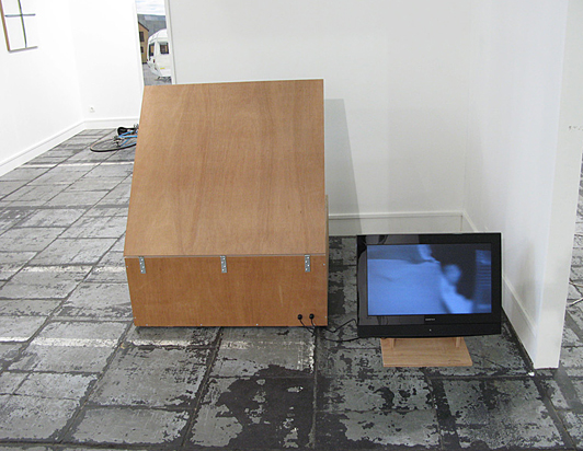 Henrik Menné: Landsskab efter hukommelse (Landscape according to menmory). 2008, model train, camera, screen, aluminium and wood, approx 200x100x100 cm