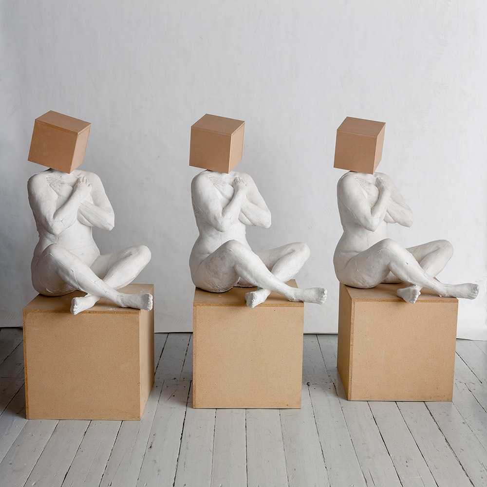 Kirsten Justesen 3 x HVID 1:1:1 1999 Installation for a number of plywood plinths, plaster casts, fittings and 3 x 37 man hours Each: 180 x 60 x 60 cm Foto: Hans Ole Madsen
