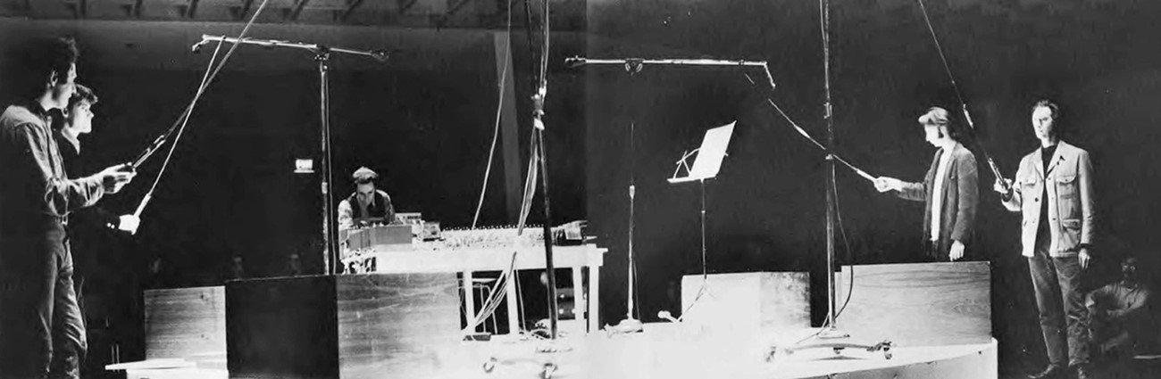 Steve Reich: Pendulum Music. Performed in May 1969 at the Whitney Museum, New York by (left to right) Richard Serra, James Tenney, Steve Reich, Bruce Nauman and Michael Snow. Photo: Richard Landry, 1969, Performance