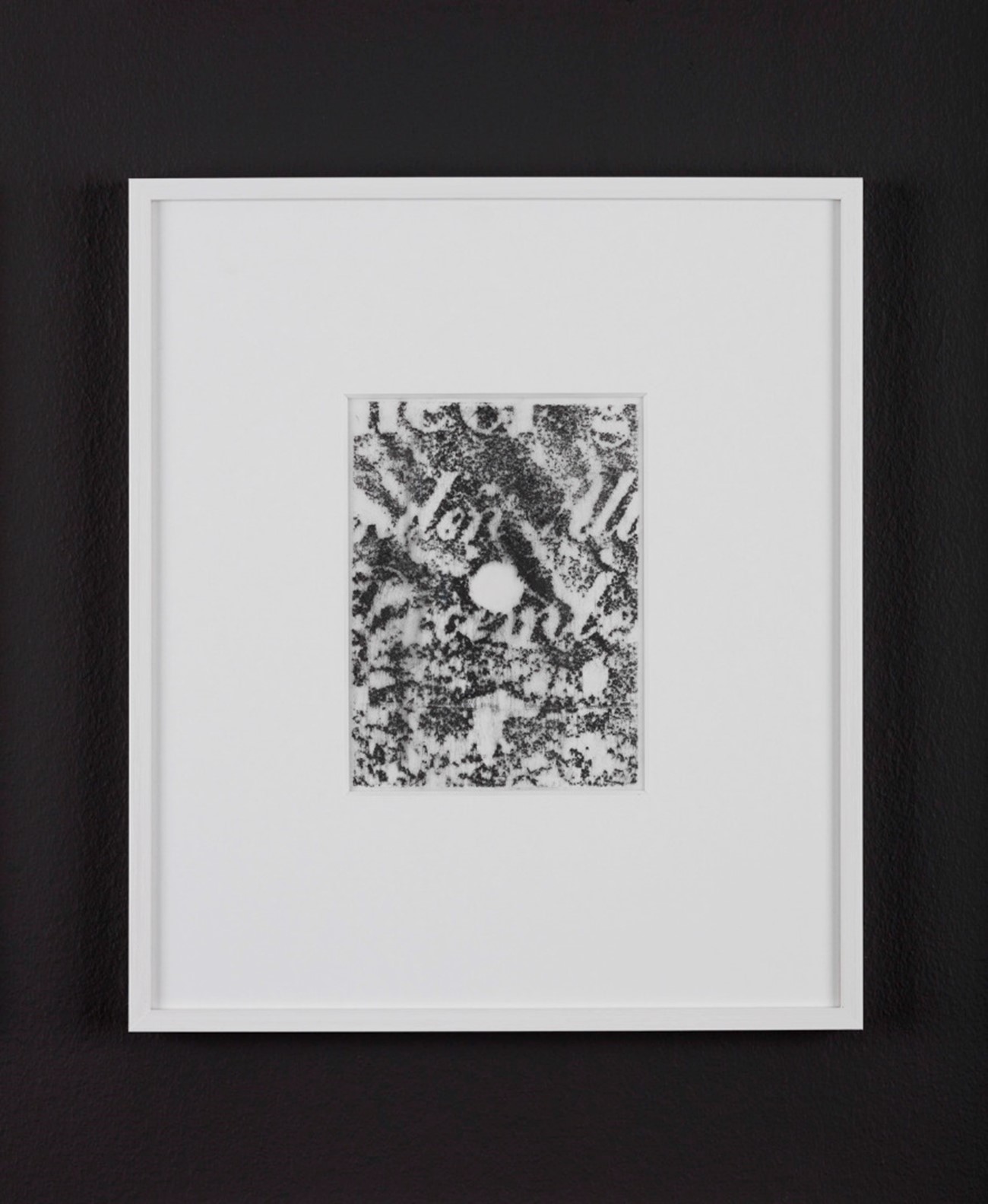 Andreas Albrectsen: Calibergraphy, 2015, Bullet holes found in monuments in Wroclaw and Berlin Graphite frottage on tracing paper, 41,7 x 36 cm x 27