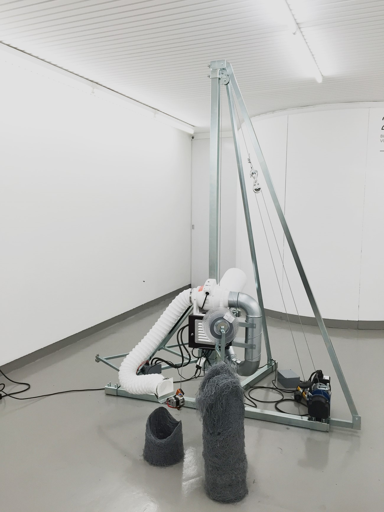 Henrik Menné: P160 - Cylindrical Print Contrivance (detail), 2016, Iron, Electronics, plate, PLA, motor and carbon filter, 225x90x180 cm