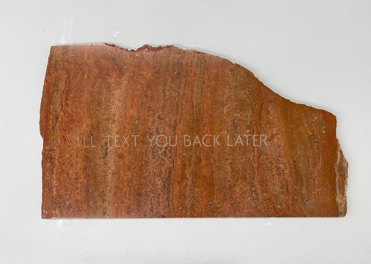 Morten Søndergaard: I'LL TEXT YOU BACK LATER, 2020, Persisk travertin, 45 x 76 cm