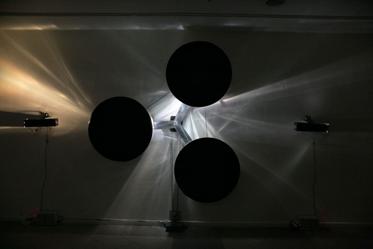 Skeel & Skriver in collaboration with Clive Ellegaard: Dark Matter, 2018, Mill, straps, power supply, lamps, metal and wood, 210 x 350 x 40 cm., Created in collaboration with Morten Skriver and Clive Ellegaard.